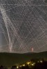 APOD - Comet R3 PanSTARRS Behind Satellite Trails
