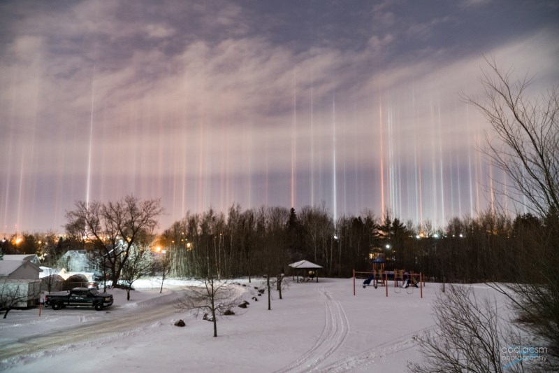 Light pillars from last night and this morning Moncton city sky.jpg