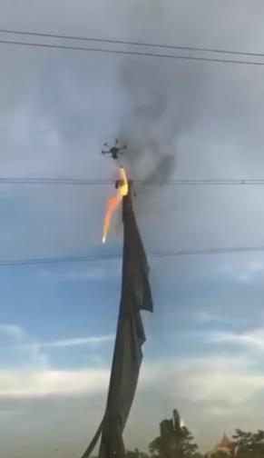 twitter.com Scientific Tech - Drone with a flamethrower to clear debris from power lines.jpg