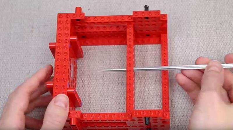 youtube.com Brick Experiment Channel - Can Lego BREAK a Steel Axle.jpg